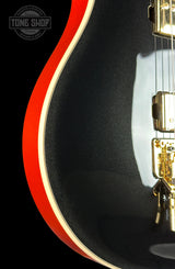 Front detail of EVH Custom Shop Wolfgang 2H Black Metallic/Candy Tangerine.