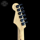 Guitar neck with Fender tuners on a black background, featuring the Tone Shop logo.