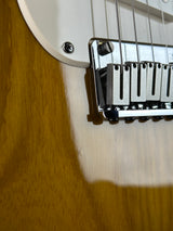 Ding on body of Used 2005 Fender 50th Anniversary Stratocaster 2-Tone Sunburst.