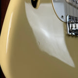 Ding on body of Used 2018 Fender Eric Johnson Thinline Strat Vintage White.
