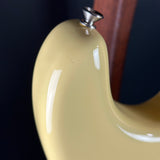 Ding on upper horn of Used 2018 Fender Eric Johnson Thinline Strat Vintage White.