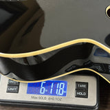 Guitar on a digital scale displaying weight