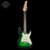 A Fender electric guitar with a vibrant green to white sunburst finish, a white pickguard, and a maple neck, shown against a solid black background with a Tone Shop watermark in the top left corner.