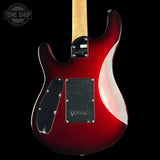 Rear view of an electric guitar with a glossy red-to-black sunburst finish, black pickups, and a light wood neck, shown against a black background with a Tone Shop watermark.