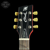 Guitar headstock with 'Club' branding on a black background