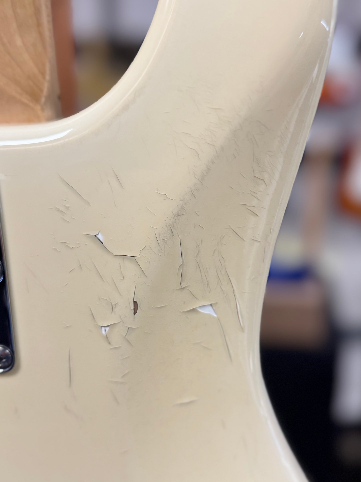 Close up of paint peel on Used 2007 Ernie Ball Music Man StingRay5 H White w/case TSS6510