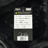 Product tag on a black textured background