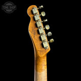 Guitar headstock with tuning pegs on a black background, featuring 'Tone Shop' logo.