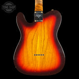 Guitar body with a sunburst finish on a black background, featuring the Tone Shop logo.