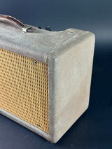 Side of Vintage Fender Reverb Tank Brown.