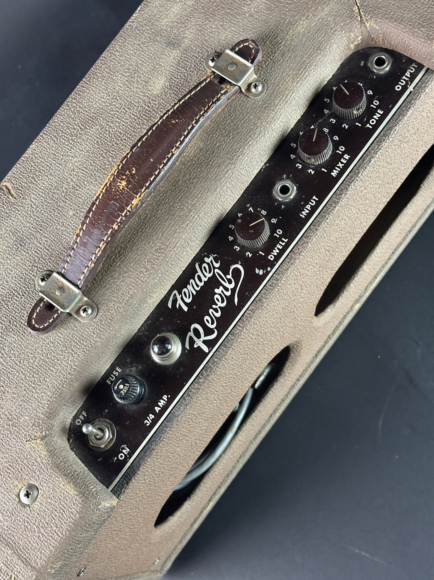 Panel of Vintage Fender Reverb Tank Brown.