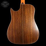 Wooden acoustic guitar body on a black background with 'Tone Shop' logo.