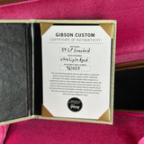 Gibson Custom certificate of authenticity on a red background