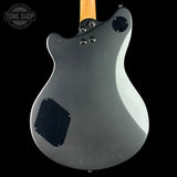 Back view of a gray electric guitar with a visible brand logo in the corner.