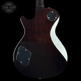 The back of an electric guitar with a glossy dark reddish-brown finish, featuring a white curved inlay, black pickguard, and circular control knobs, shown against a black background.