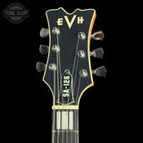 Guitar headstock with 'EVH' branding on a black background