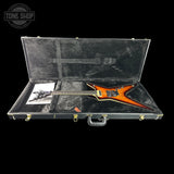 Guitar in a case with 'Tone Shop' logo in the corner