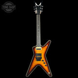 Electric guitar with a sunburst finish on a black background, featuring the Tone Shop logo.