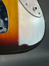 Close-up of a guitar's body with a gradient finish.