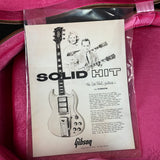 Gibson Les Paul guitar advertisement on a pink background