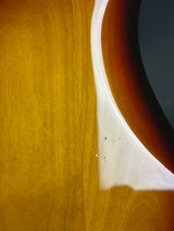 Close-up of a wooden surface with a circular cutout