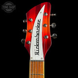 Guitar headstock with 'Rickenbacker' branding on a black background