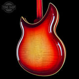 Glossy red electric guitar on a black background with 'Tone Shop' logo.