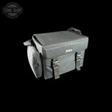 Gray bag with a visible brand logo on a black background