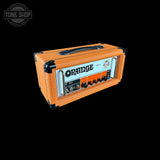 Orange guitar amplifier head with 'Tone Shop' logo in the corner