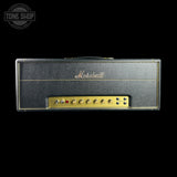 Marshall amplifier head with gold accents on a black background