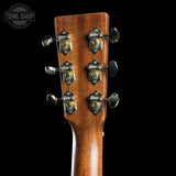 Guitar headstock with tuning pegs on a black background, featuring 'Tone Shop' logo.