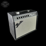 Fender amplifier on a black background with 'Tone Shop' logo.