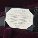 Certificate of Authenticity for a Martin guitar on a dark background