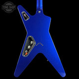 A blue electric guitar body with a star-shaped contoured design, featuring a glossy blue finish with subtle silver glitter speckles, a chrome hardware pickguard, and a black control plate with silver knobs, shown against a solid black background.