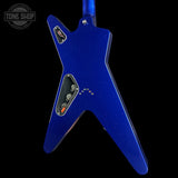 A blue star-shaped electric guitar body, likely a Gibson Vintera model, shown against a solid black background with a Tone Shop watermark in the top left corner.