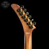 Gibson guitar headstock with 12 strings on a black background