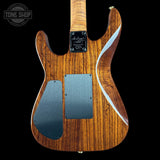 Wooden electric guitar body with brand logo on a black background