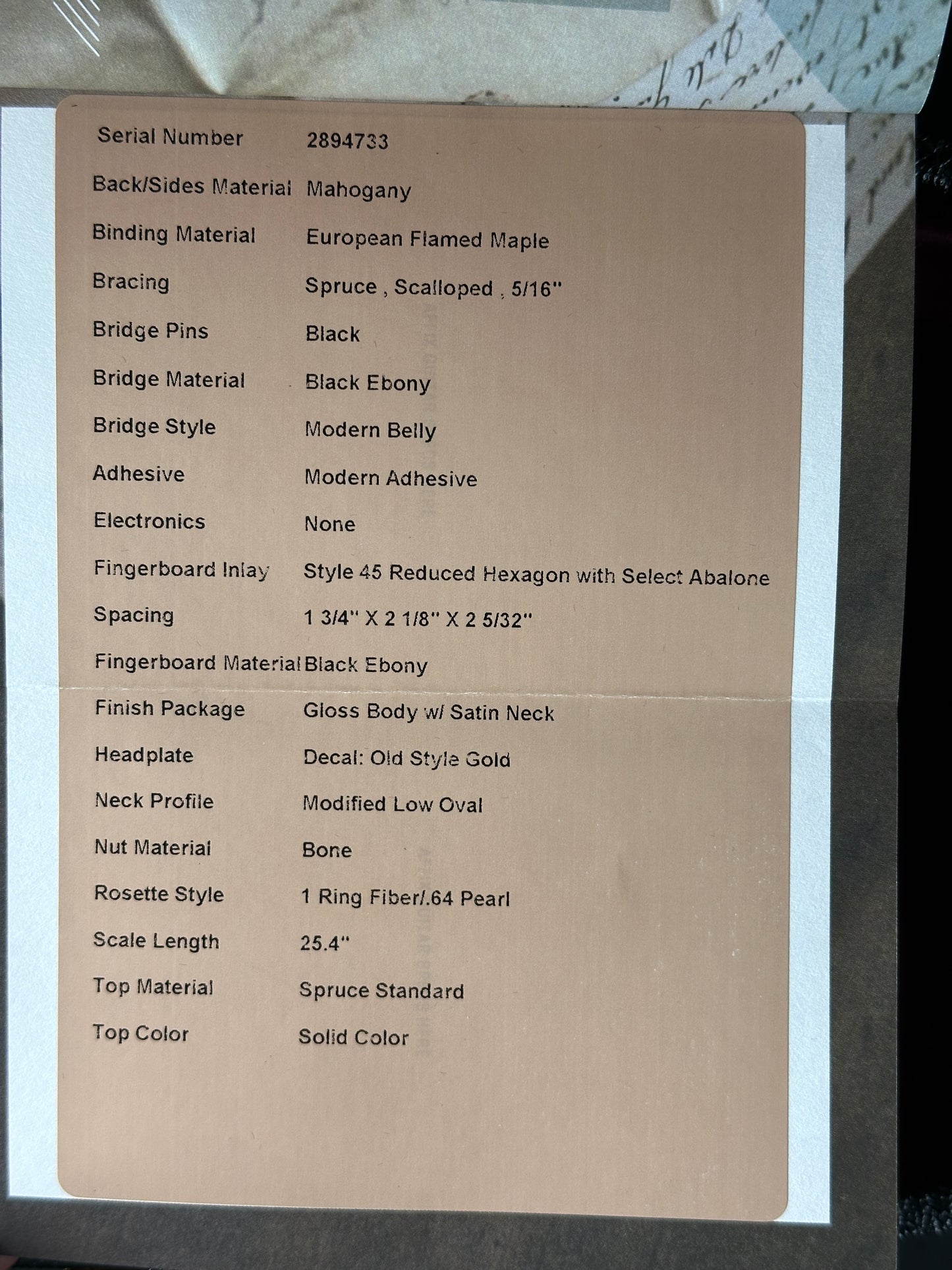 Spec sheet for Martin Custom Shop Slope Shoulder Dread Spruce/Mahogany Burgundy.
