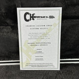 Charvel guitar certificate on a dark textured background