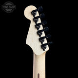Guitar headstock with tuning pegs on a black background, featuring the Tone Shop logo.