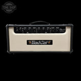 Bad Cat Leo 30 guitar amplifier head in cream-colored textured leatherette with a black control panel and black trim, shown against a solid black background.