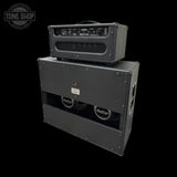 A black RockTrot amp head stacked on top of a matching black RockTrot speaker cabinet against a solid black background, with a Tone Shop watermark in the upper left corner.