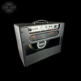 Guitar amplifier with 'Bad Cat' branding on a black background, featuring the Tone Shop logo.