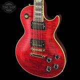 Red electric guitar with a black background