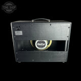 Guitar amplifier with 'Bad Cat' speaker on a black background, featuring the Tone Shop logo.