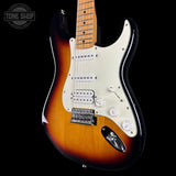 Electric guitar with a sunburst finish on a black background, featuring the Tone Shop logo.