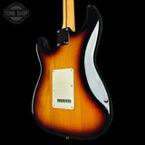 Electric guitar with sunburst finish on a black background, featuring the Tone Shop logo.