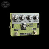 A Dumbleb' '8' guitar effects pedal with a textured sage green body, silver metal faceplate, and four control knobs labeled Drive, Accent, Tone, and Volume. The pedal features a footswitch on the bottom left and a tone knob on the bottom right, set against a solid black background.