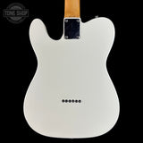White electric guitar body with a visible brand logo on a black background