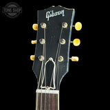 Gibson guitar headstock with black background